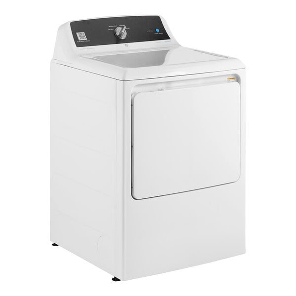 A white GE front load commercial dryer with a door.