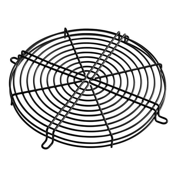 A black metal fan cage with a circular design and holes.