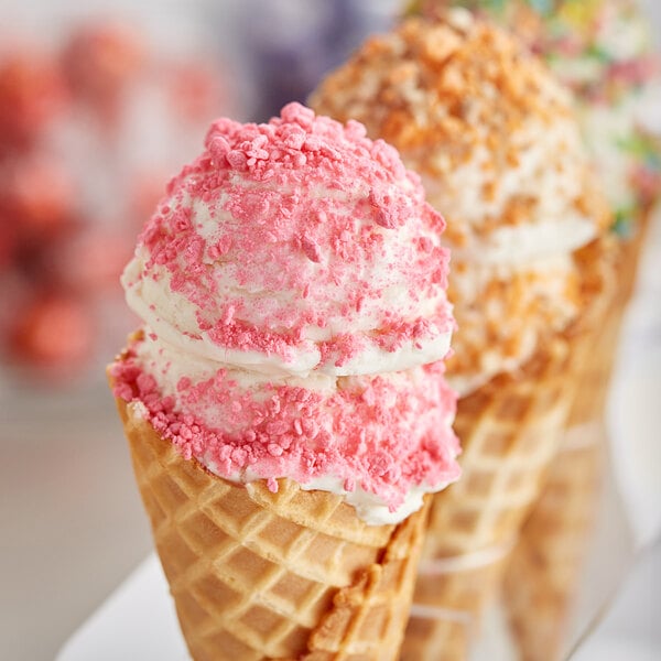 Three ice cream cones topped with Yum Crumbs Bubble Gum crumb topping.