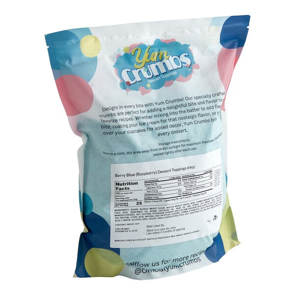 A white bag of Yum Crumbs Berry Blue crumb topping with blue and white text and a label.