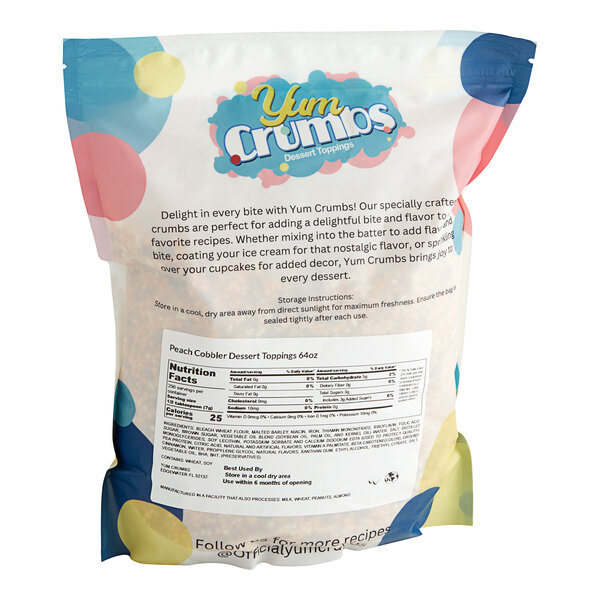 A white bag of Yum Crumbs Peach Cobbler Crumb Topping with a label.