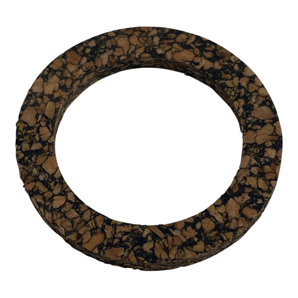 A round brown and black cork gasket with a hole in it.