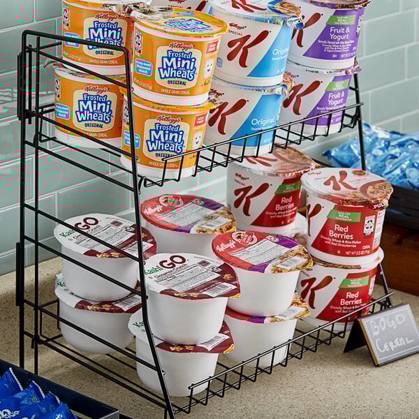 A rack of Kellogg's Wellness Cereal cups.