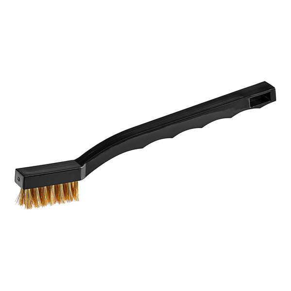 A black brush with gold bristles and a black handle.