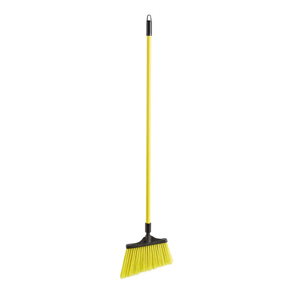 A yellow O-Cedar commercial broom with a black handle.