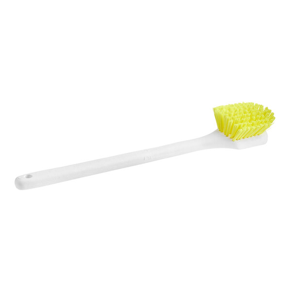 A yellow O-Cedar utility brush with yellow bristles and a white handle.