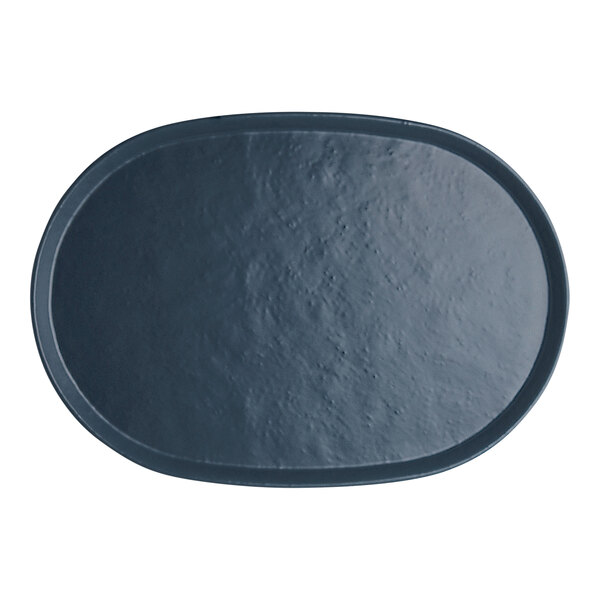 A black oval Harbor melamine tray with a dark blue surface.