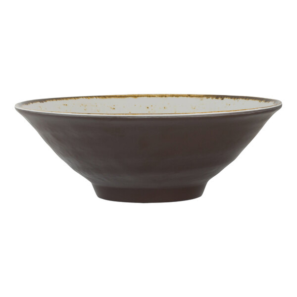 A Creations Craft brown melamine bowl with a white rim.