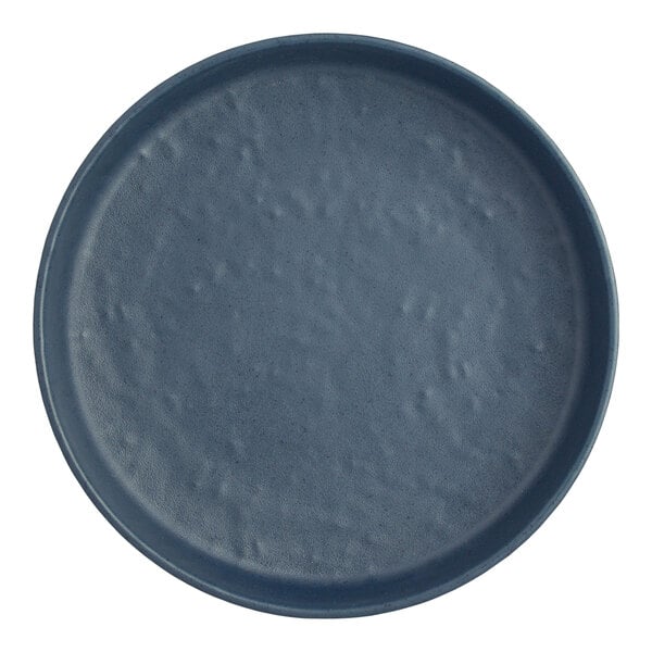A blue Creations Cali melamine plate with a small hole in the middle.