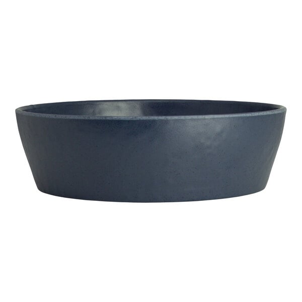 A Creations Cali melamine bowl with a dark blue rim on a white background.