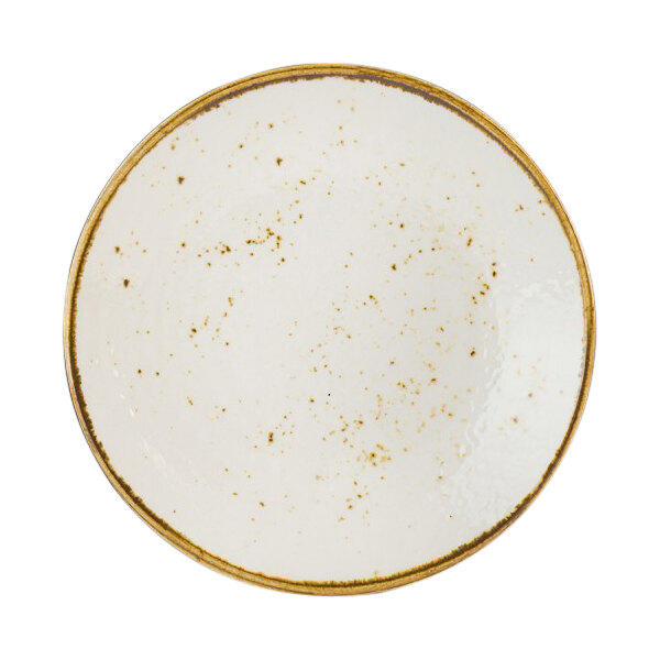 A white plate with brown specks.