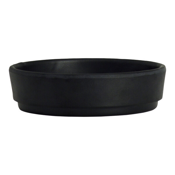 A close-up of a black Creations Cali melamine ramekin.