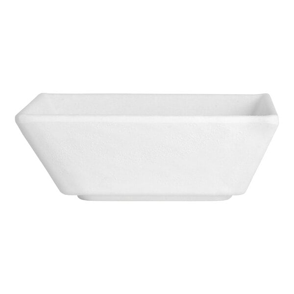 A white rectangular dish with a white background.