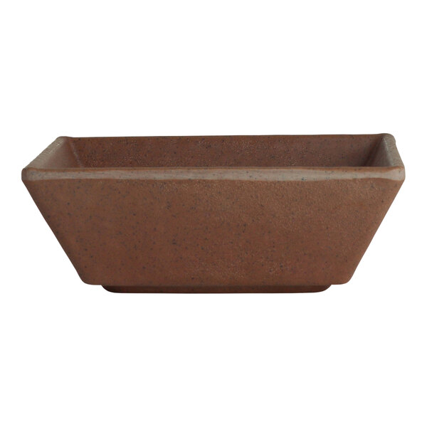 A brown rectangular melamine sauce cup with a brown base.