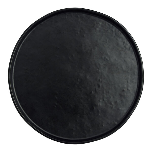 A black round Creations Cali melamine plate with a black rim.