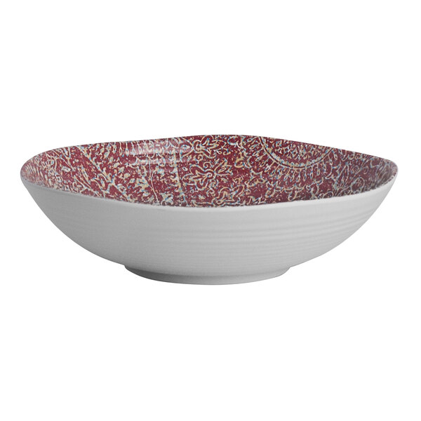 A close-up of a Steelite Solano melamine bowl with a red design.