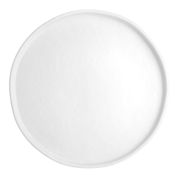 A close-up of a white Creations Cali melamine plate with a round rim.