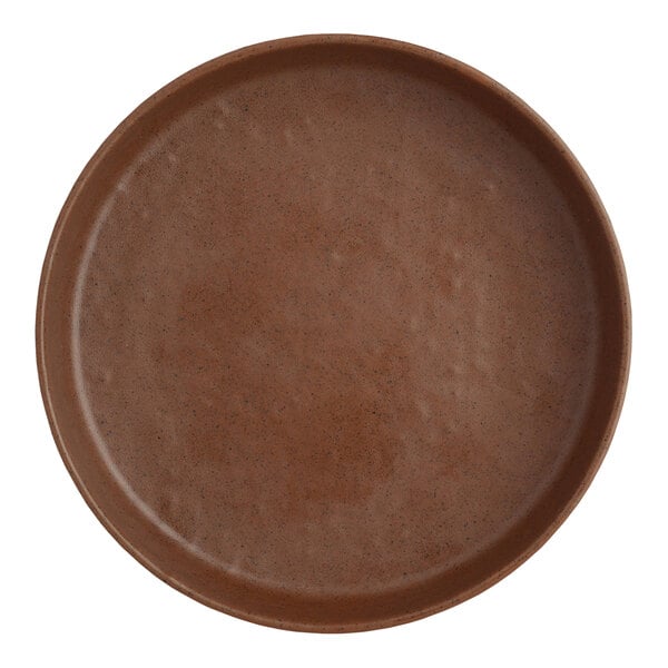 A brown Creations Cali melamine plate with a speckled surface.