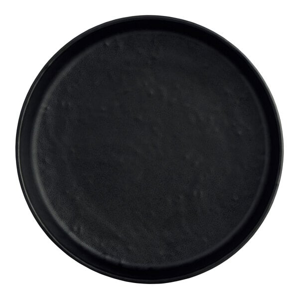 A close-up of a black Creations Cali melamine plate with a black rim.