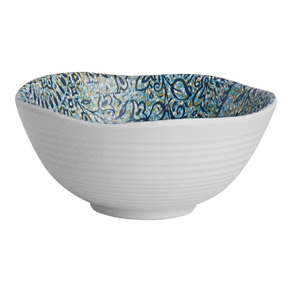 A white bowl with blue and yellow design.