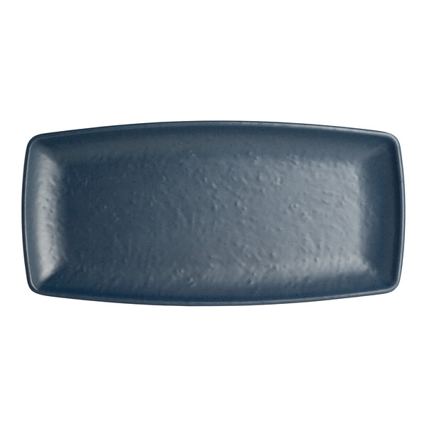 A white rectangular melamine plate with a textured dark blue surface.