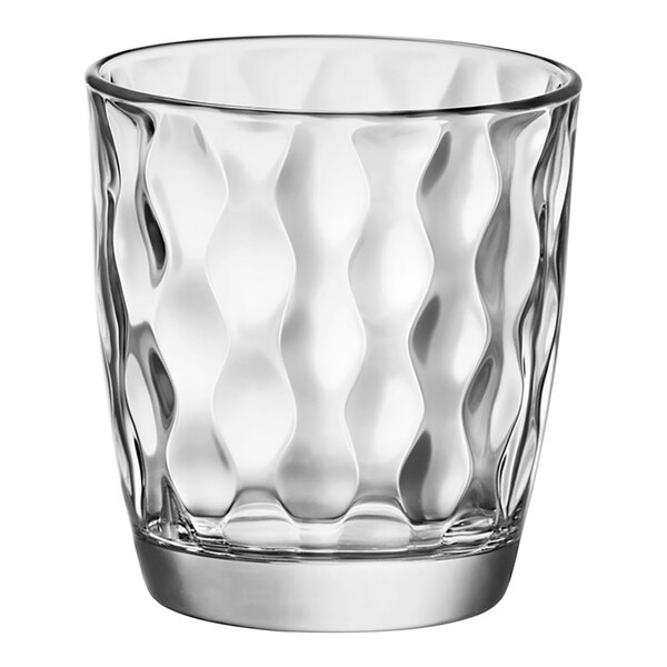 A Bormioli Rocco clear glass tumbler with wavy lines.