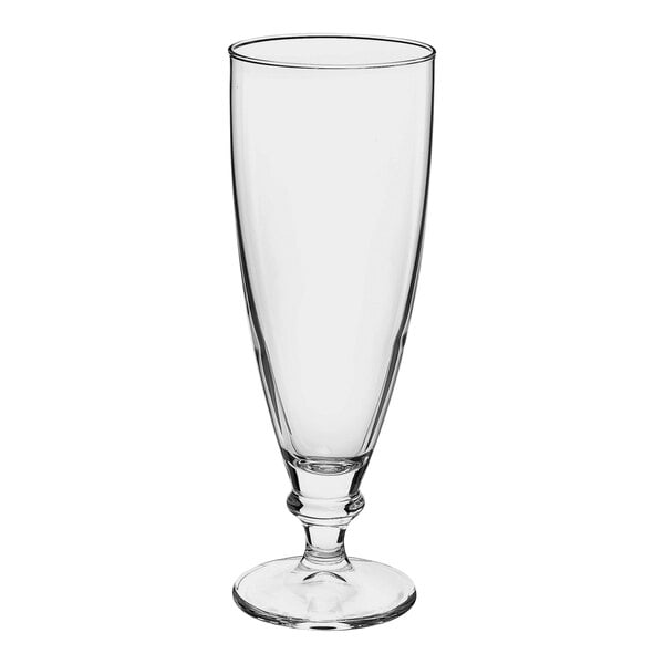 A clear Bormioli Rocco footed pilsner glass with a small base.