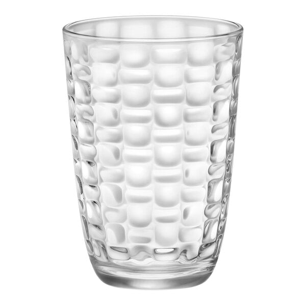 A clear Bormioli Rocco long drink glass with a pattern.