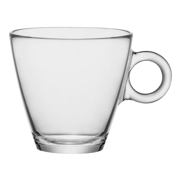 A Bormioli Rocco clear glass cappuccino cup with a handle.