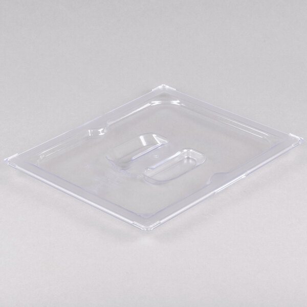 A Vollrath clear polycarbonate lid on a clear plastic food pan.