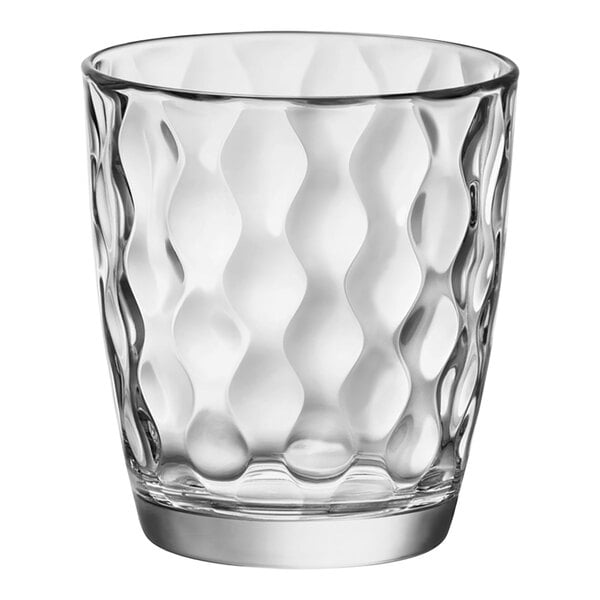 A Bormioli Rocco clear glass tumbler with a wavy pattern.