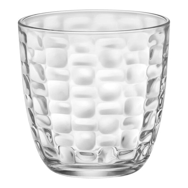 A clear Bormioli Rocco water glass with a textured pattern.