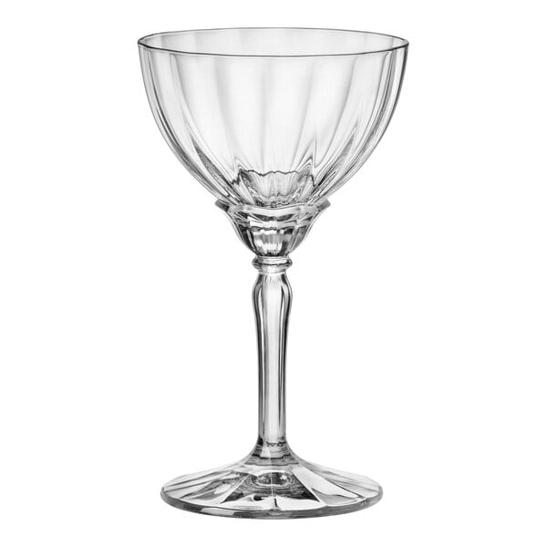 A close-up of a Bormioli Rocco Florian wine glass with a long clear stem.