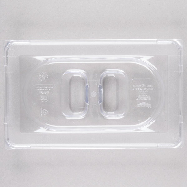 A clear plastic Vollrath Super Pan lid with two ovals.
