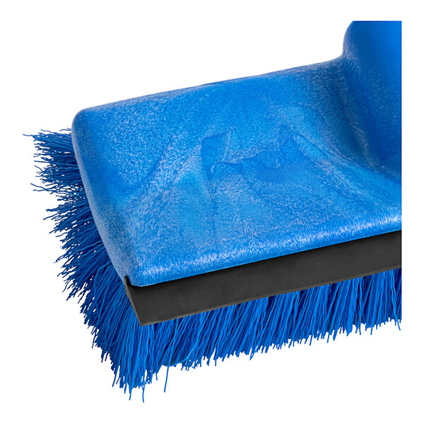 A Lavex blue deck brush with a black metal handle.