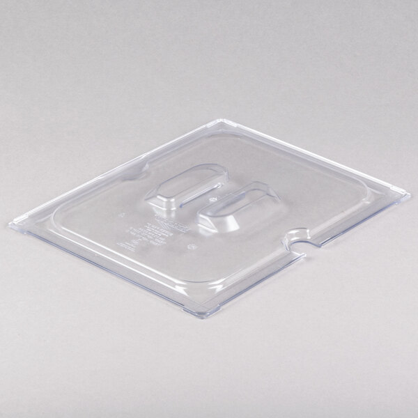 A clear plastic container with a slotted lid.