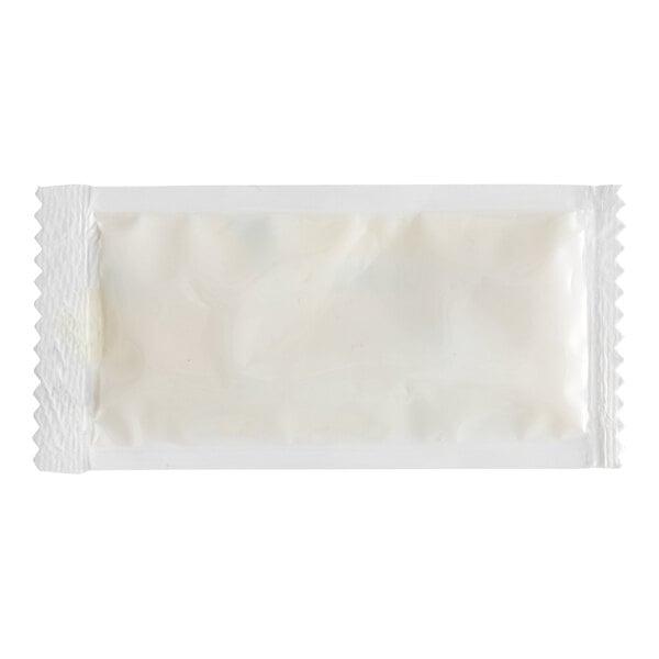 A white Kari-Out Company lemon juice packet.