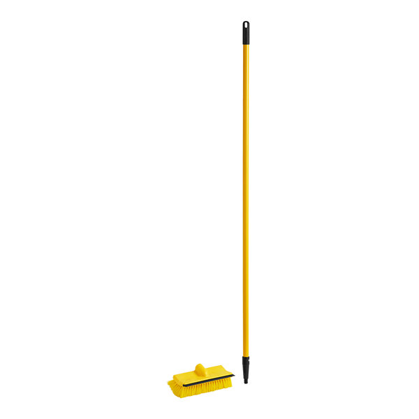 A yellow Lavex brush with a black metal handle.