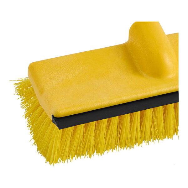 A yellow Lavex deck brush with a black metal handle.