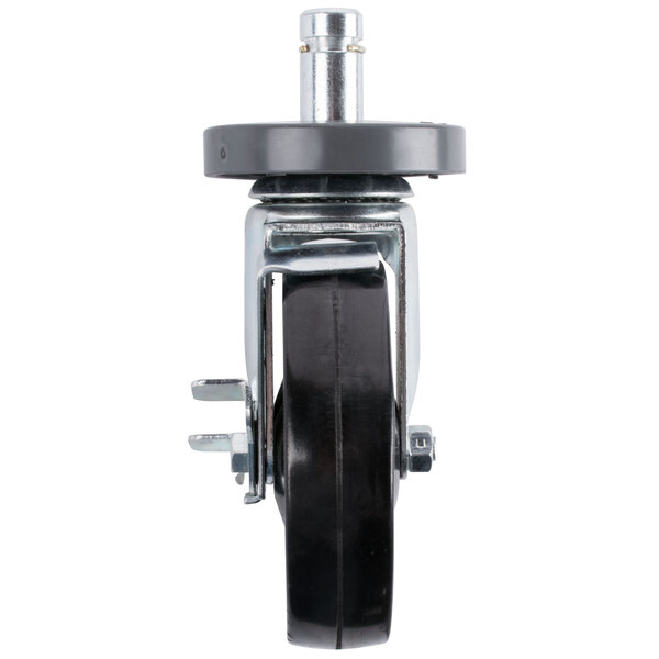 A close-up of a Metro Super Erecta black and silver rubber caster wheel.