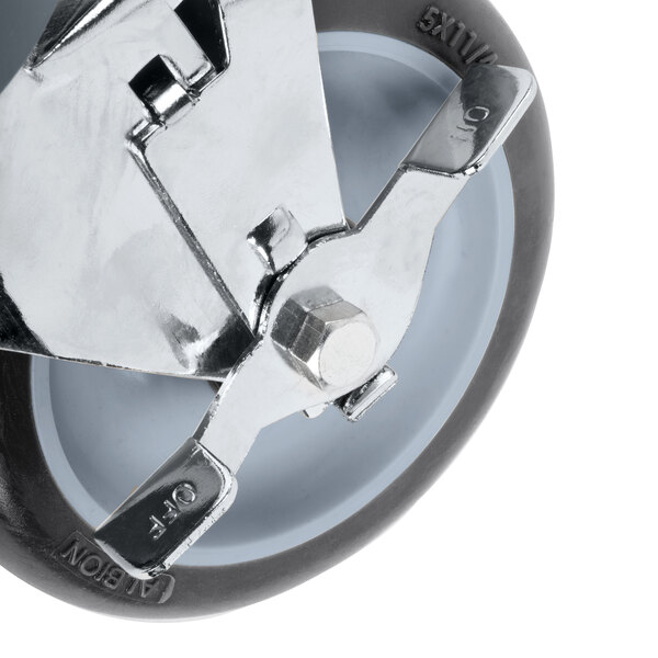 A close-up of a Metro Super Erecta poly caster wheel.