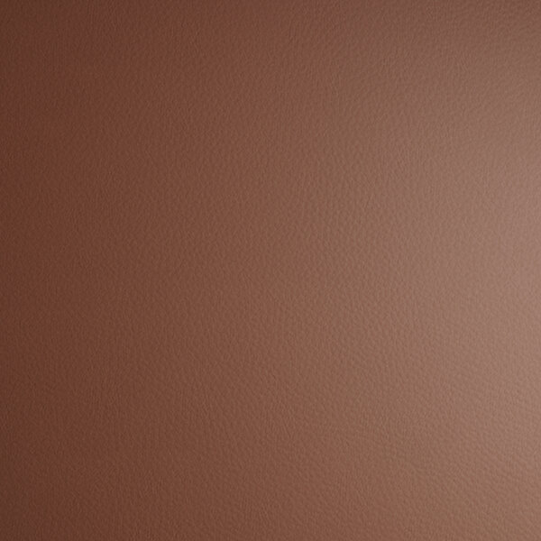 A close up of a dark brown vinyl surface.