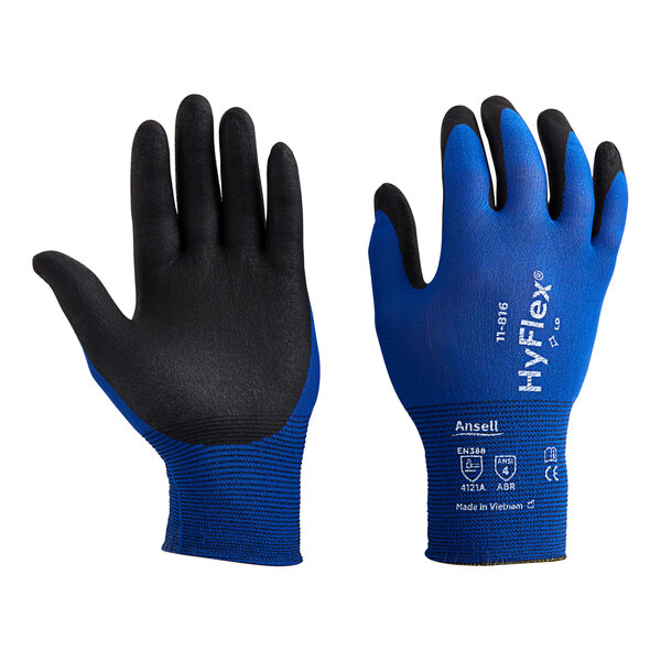 A pair of blue gloves with black palm coating and knit wrist.