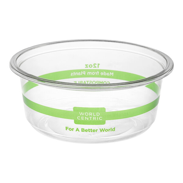 A clear 12 oz. compostable plastic deli container with green labeling from World Centric.