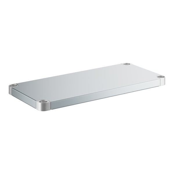 A silver rectangular shelf with metal corners.