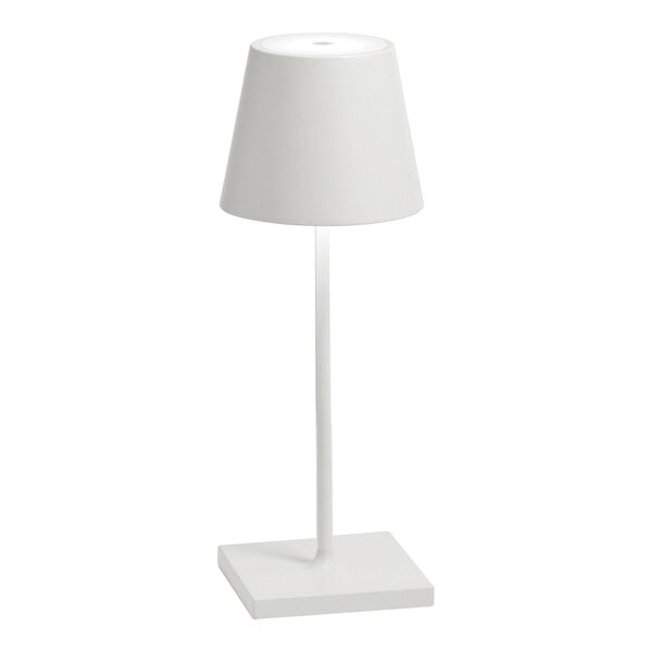 A small white cordless rechargeable table lamp with a conical shade and square base.