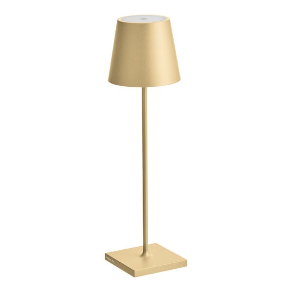 A Zafferano America Poldina Pro gold table lamp on a stand with a white shade.