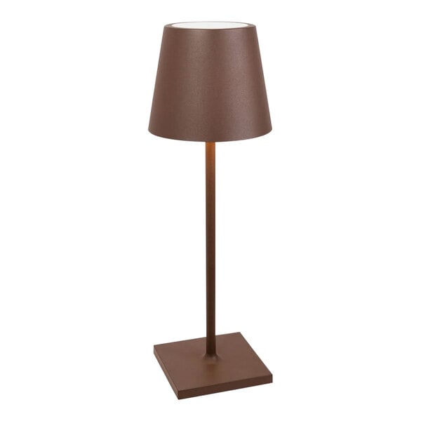 A brown Zafferano America Poldina Pro desk lamp on a metal base with a brown shade.