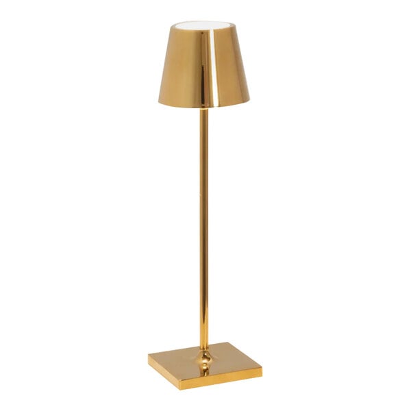 A Zafferano America Poldina Pro glossy gold table lamp on a stand with a white shade.