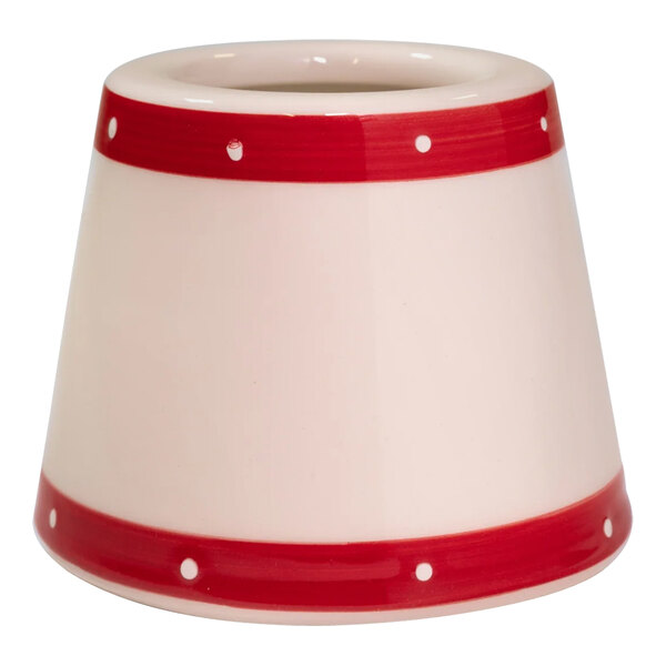 A white and red lampshade with red stripes on the bottom.